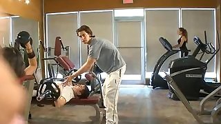 Hot blonde MILF teases a full gym and..